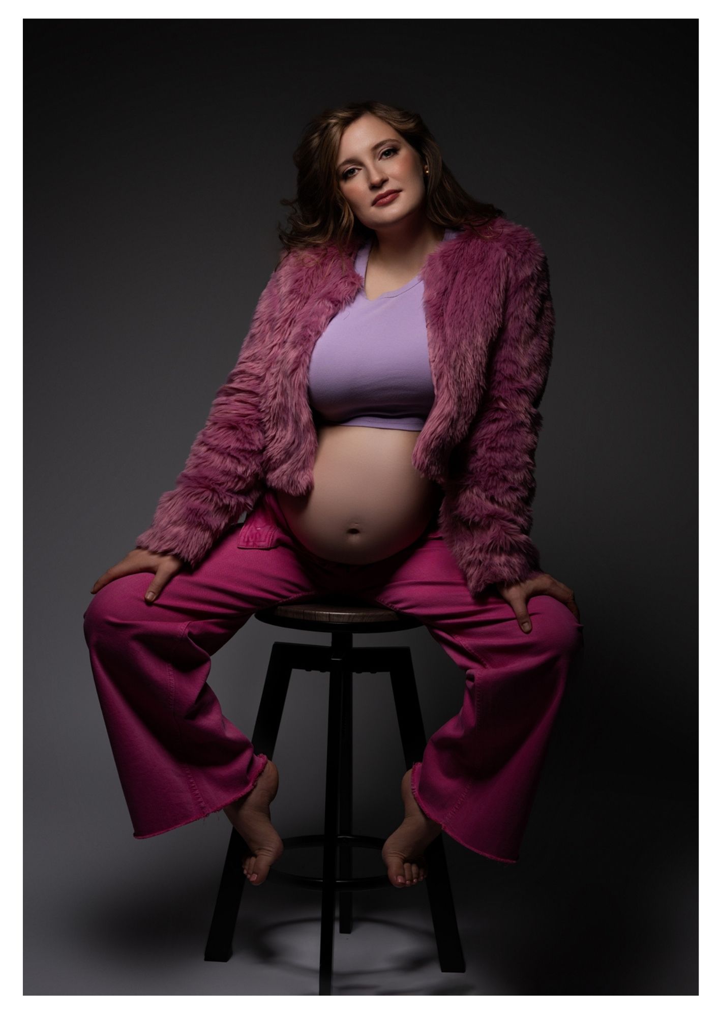 Expecting mother photographed during a maternity portrait session in Newton, Massachusetts